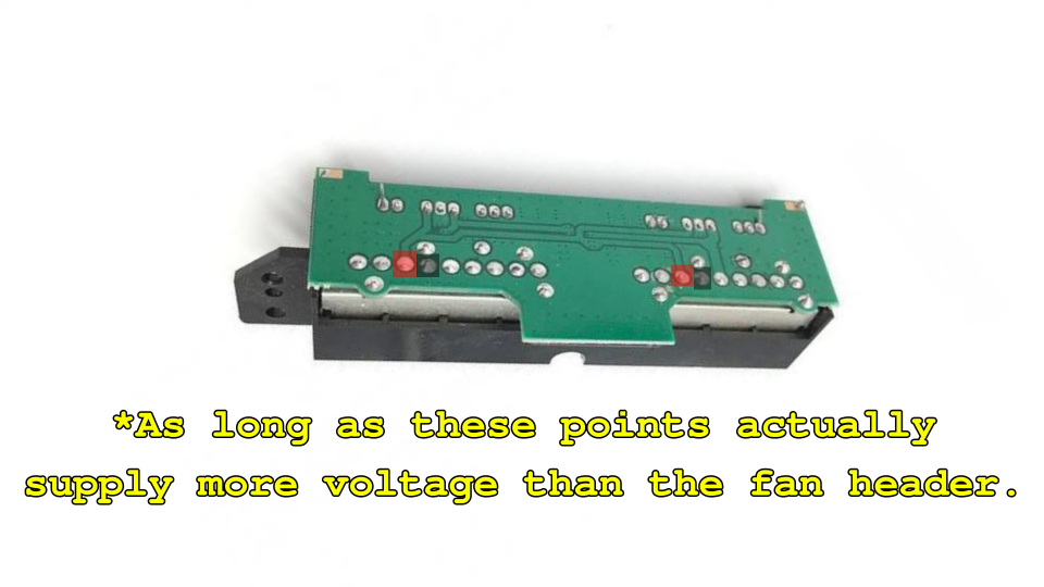 A PS2 controller daughter board with power and ground points highlighted